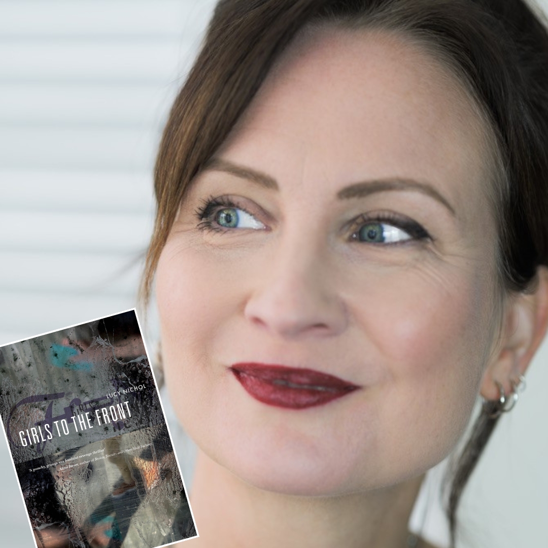 A woman with blue eyes and dark red lipstick smiles softly, looking to the side. A faded book cover titled "Girls to the Front" overlays the image.