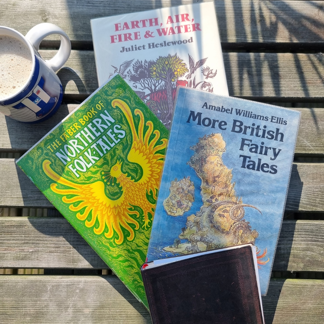Four books are scattered on a wooden table, alongside a cup of coffee. The scene conveys a cozy, peaceful morning vibe with sunlight casting shadows.